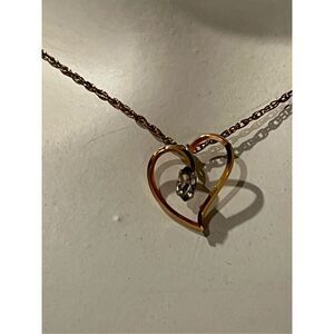 Kremetz Heart Pendant on Gold Tone Chain